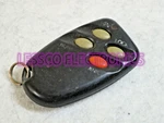 Fits: Dodge Chrysler Mitsubishi E4EGDF Remote Garage Door Btn Transmitter Fob. Fixed Price $13.00.
