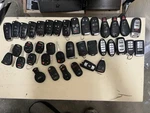 Lot Of 38 Smart Keys Fobs Remotes Transmitters Keyless Entry Oem. Fixed Price $109.00.